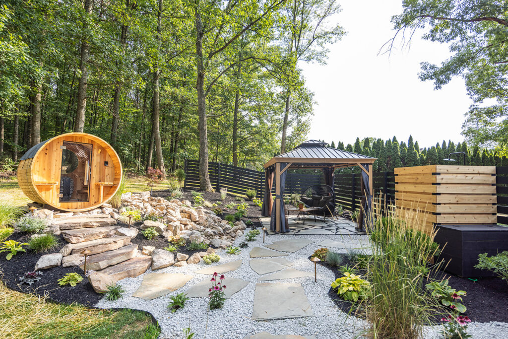 backyard of an airbnb with a sauna and canopy